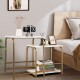 Compact faux marble nesting tables with gold powder-coated steel, perfect for small spaces and versatile use.